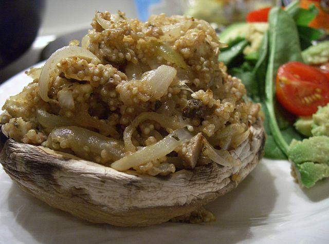 Mushroom stuffed with spicy quinoa.