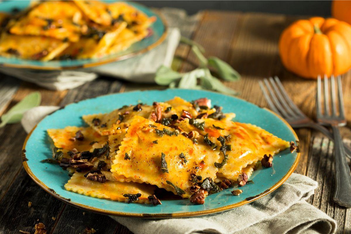A plate with cooked pumpkin ravioli.