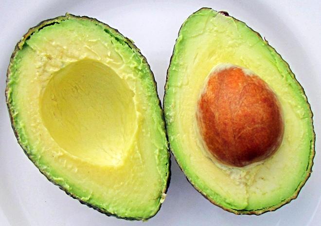 An avocado halved alongside.