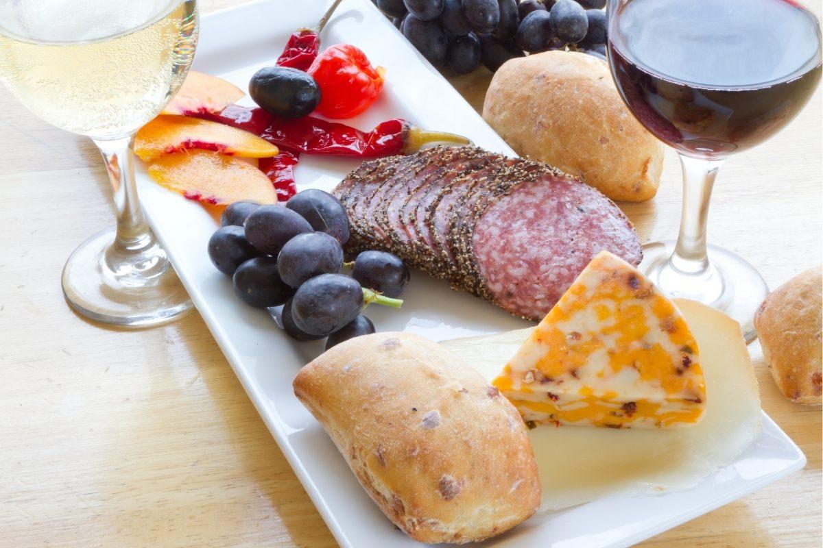 White and red wine with a selection of food.