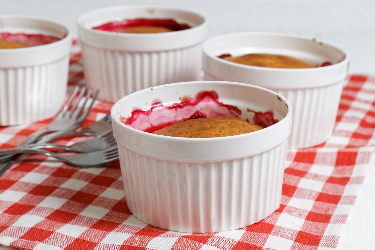 Individual apple raspberry cobblers.