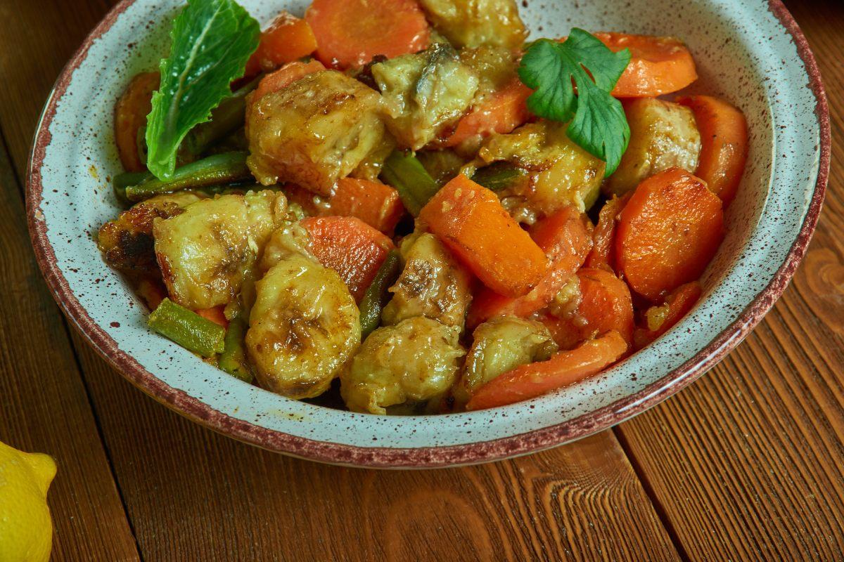 A bowl of poulet DG, a delicious Cameroonian dish.