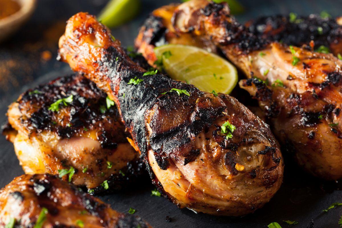 Jerk barbecued chicken drumsticks, Caribbean style.