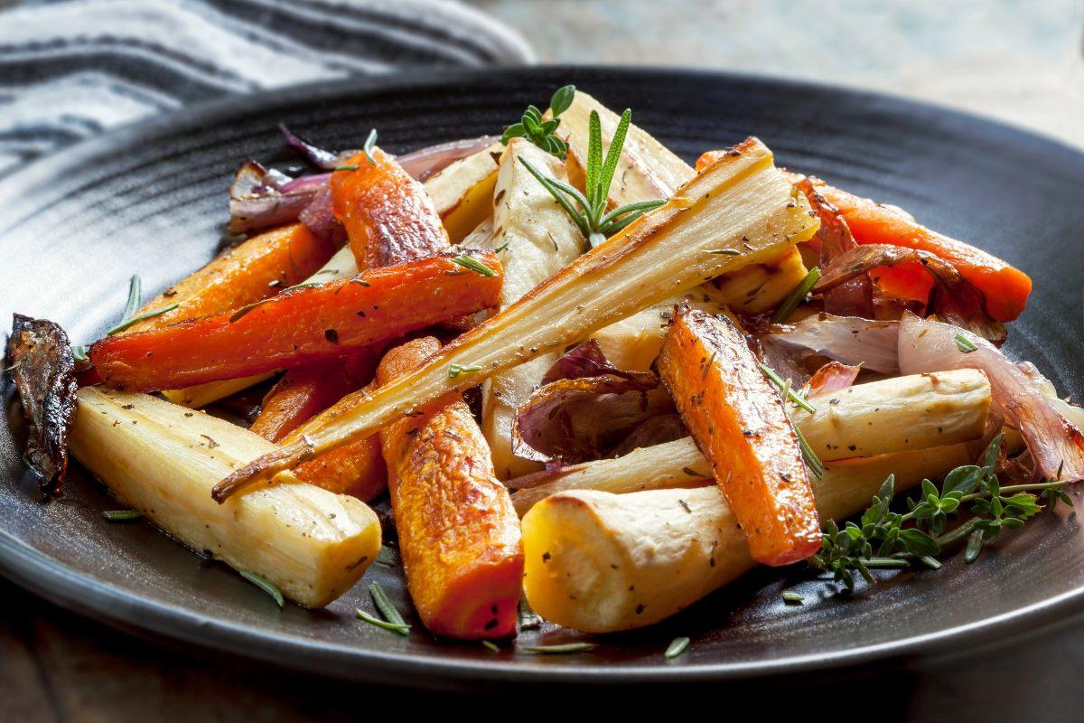 A plate with a selection of root vegetables roasted.