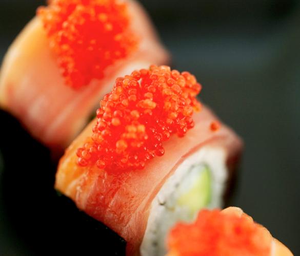 Bacon wrapped sushi rolls.