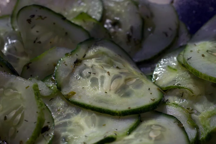 Detail of vinegared cucumber slices.