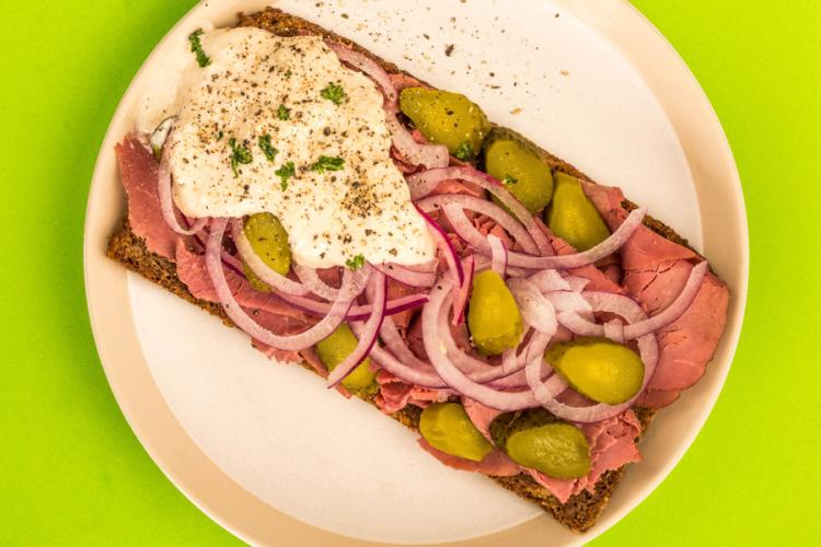 Open faced roast beef sandwich.
