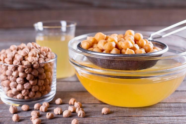 Raw chickpeas, cooked chickpeas and aquafaba, the liquid from cooking them.