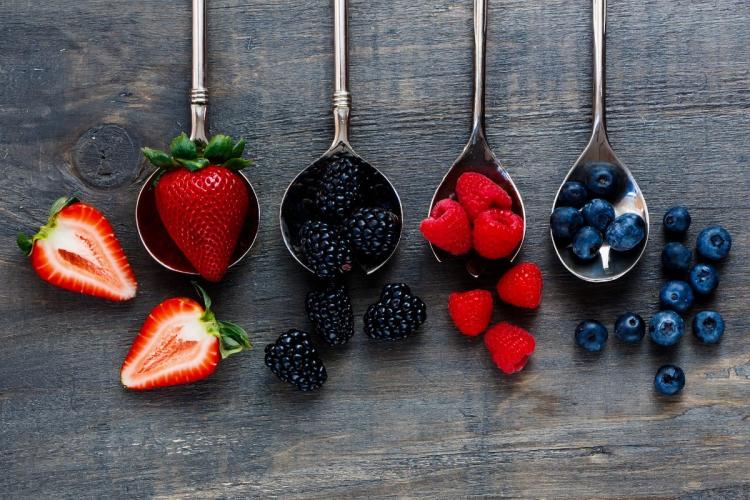 A selection of edible berries including strawberries. blackberries, raspberries and blueberries.