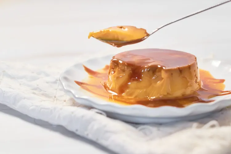 Detail of an individual flan on a plate.