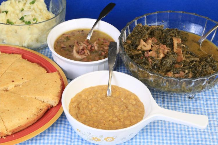 Creamed corn, black eyed peas, collard greens, mashed potatoes and corn bread.