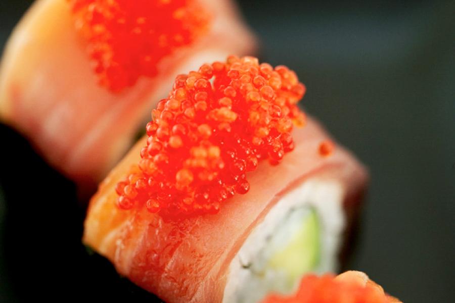 Bacon wrapped sushi rolls.