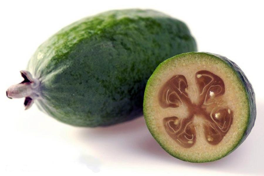 Whole feijoa and feijoa section.
