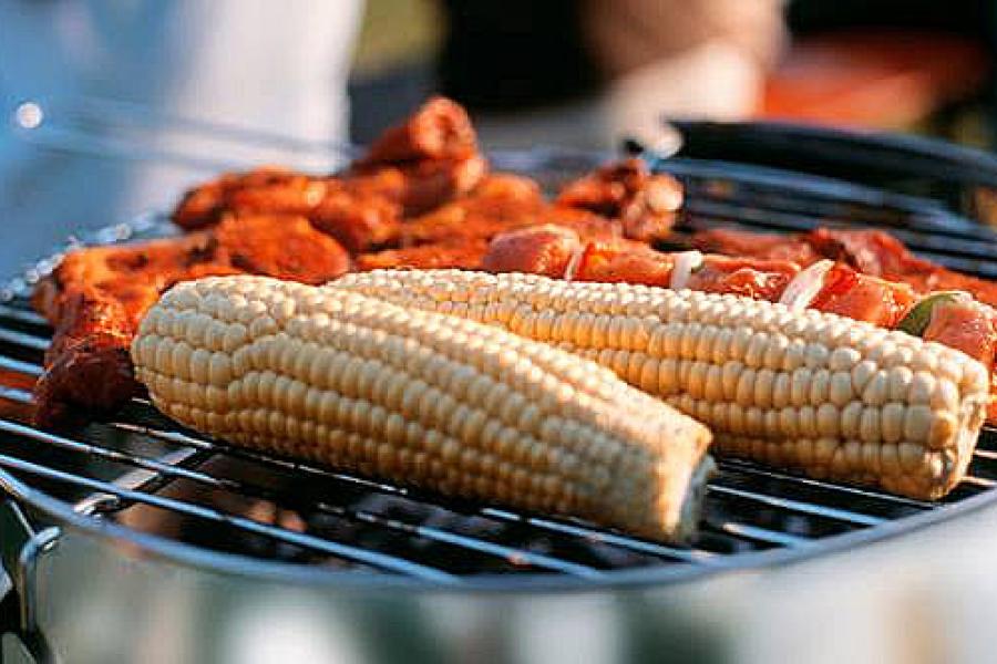 Grilling corn and kebabs.
