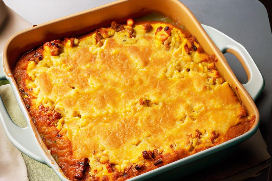 A baking dish with cornbread casserole, generative AI.