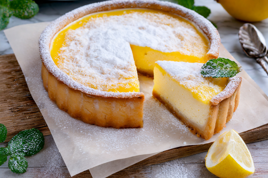 Irish lemon curd cheesecake dusted with powdered sugar.