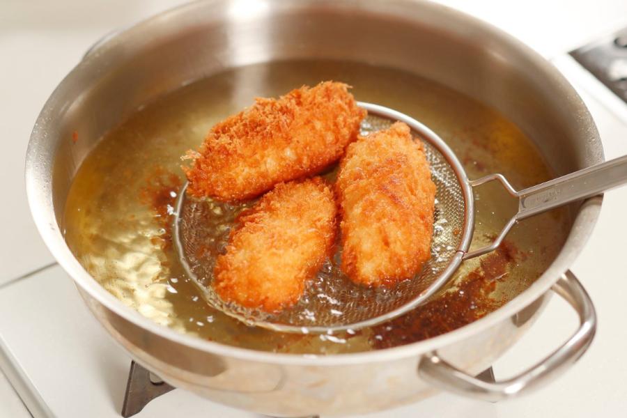 Depp frying croquettes in cooking oil
