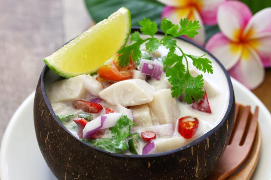 Kokoda served in a coconut shell.