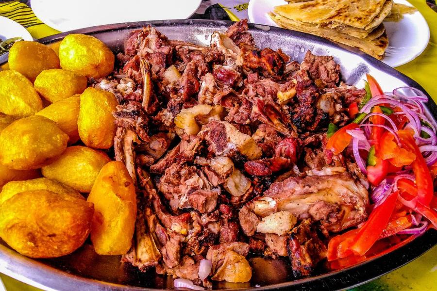 The typical nyama choma with kumburi and potatoes.