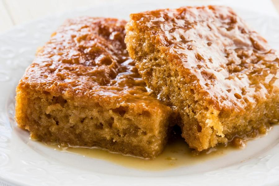 Two pieces of malva pudding.